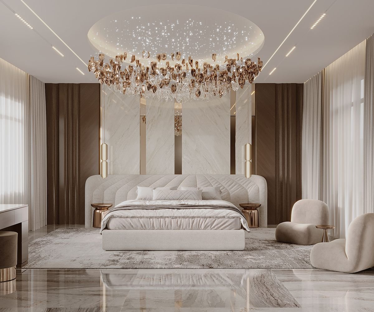 Grand luxury bedroom with gold chandelier and channel-tufted upholstered bed